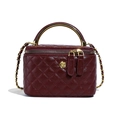 Quilted wine red crossbody box bag with gold floral clasp and metal handle - Burgundy