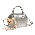 Chic silver metallic pillow bag with plush bear charm and adjustable shoulder strap - Silver With Bear Charm