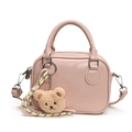 Pink matte PU leather pillow bag with top handle and plush bear charm for women - Pink With Bear Charm