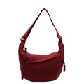 Deep red nylon crescent crossbody bag with adjustable strap and long zipper pulls - Burgundy