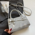 Elegante borsa a mano grigio chiaro strutturata con fiocco e tracolla lunga - Senza Ciondolo / Argento