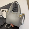 Chic silver lychee pattern bucket bag with golden hardware and adjustable shoulder strap - Silver - No Charm