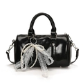 Black bowling bag with large white lace bow and elegant pearl charm in glossy finish - Black + Pearl Lace Bow