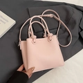Lichtroze bucket bag met litchi-textuur, geknoopte handvaten en verstelbare riem - Zonder Hanger / Roze