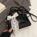 Minimalist black patent leather pillow bag featuring a stylish white lace bow decoration - No Pendant / Black