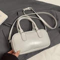 Bolso bowling minimalista en gris claro de piel sintética con una correa desmontable - Gris sin Colgante