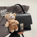Fashionable black glossy crossbody handbag with silver buckle and cute teddy bear charm - Black + Khaki Bear