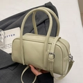 Chic mint green leather boston bag with top handles and adjustable crossbody strap - Green - No Charm