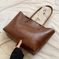 Borsa tote in pelle marrone con design patchwork geometrico e spalline sottili - Caffè Senza Ciondolo