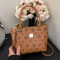 Braune bedruckte Beuteltasche mit Katzenmuster, runden Griffen und Goldlogo - Braun - Ohne Anhänger