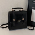 Minimalist black glossy leather backpack with gold metal hardware and top handle - Black - Without Pendant