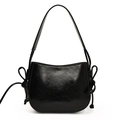 Minimalist black oil wax leather bucket bag with elegant side drawstring knot detail - Black