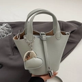 Litchi pattern mint green bucket bag with silver lock and heart charm detail - Blue With Heart Pendant