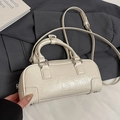 Chic beige cylinder bowling bag with crinkled texture and silver-toned hardware - Off-White (Without Pendant)