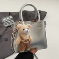 Silver metallic leather bucket bag for women with a cute plush bear pendant accessory - With Pendant / Silver