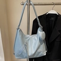 Light blue faux leather tote bag with a matching mini round pouch and front zipper detail - Blue (Without Charm)