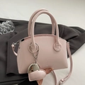Minimalist light pink leather crossbody handbag with heart charm and shoulder strap - Light Pink With Heart Pendant