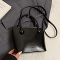 Sac seau chic en cuir noir brillant avec poignées boules et bandoulière réglable - Noir - Sans Pendentif