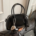 Chic black glossy pillow handbag with heart charm and adjustable shoulder strap - Black (With Heart Pendant)