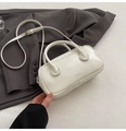 Detail of white mini box bag with CLEA ROK print on grey suit jacket background - Off White