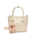 Chic cream-colored bucket bag with minimalist design and cute plush bear charm - White With Pink Sweater Dog