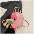 Pink lychee texture crossbody bag with cute plush puppy charm and pearl necklace detail - Pink With Pendant