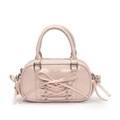 Pink patent leather Boston bag featuring ballet-style lace-up bow and dual handles - Pink