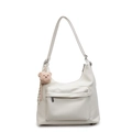 White minimalist soft leather tote bag with a pink plush bear charm and zip closure - Off White