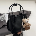 Minimalist black leather bucket bag with cute teddy bear charm and adjustable strap - Black With Bear Charm
