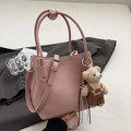 Pink lychee grain leather bucket bag with cute bear charm for elegant women's style - Pink With Bear Charm