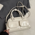 Chic cream white glossy Boston bag with dual pockets and silver hardware detailing - White without Pendant