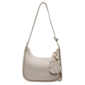 Chic beige bucket bag in lychee leather with a cute puppy charm and fashion bag lettering - Off White