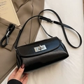 Minimalist black glossy leather pillow crossbody bag with silver rotating lock closure - Black (No Charm)