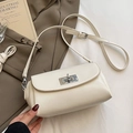Chic cream white crossbody pillow bag featuring a silver swivel lock and sleek leather finish - Cream (No Charm)