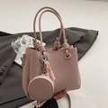 Dusty pink lychee pattern bucket bag with rope knot handle and round coin purse charm - With Matching Color Round Purse and Knot Decor / Pink