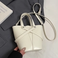 Chic beige oil wax leather bucket bag with top handle and crossbody strap design - White without Pendant