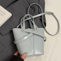 Ice blue oil-wax leather bucket bag with cross strap details and adjustable strap - Blue - Without Pendant