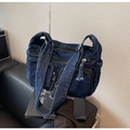 Deep blue denim shoulder bag with multiple functional pockets and vintage workwear aesthetic - Dark Blue