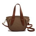 Khaki woven bucket bag with brown leather trim and adjustable crossbody strap - Brown