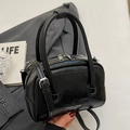 Glossy black Boston style handbag with silver hardware and adjustable shoulder strap - Black - Without Pendant