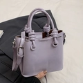 Borsa a secchiello minimalista lilla con manico a nodo e tracolla per donna - Senza Ciondolo / Viola
