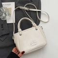 Secchiello classico bianco crema in pelle PU con dettagli logo in metallo argento - Senza Ciondolo / Bianco Sporco