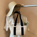 Elegante bolso tote de paja tejida crema con asas negras para vacaciones de verano - Bolso Beige Y Sombrero