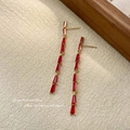 Elegant gold drop earrings with five cascading red rectangular gems and long tassels - Red