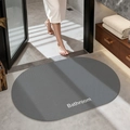 Grey oval bathroom mat with non-slip texture and white Bathroom text on top - Plain (oval) - Dark Gray