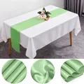Elegant light green satin table runner with a smooth silk sheen for wedding decor - 30x275cm / Apple Green