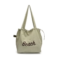 Light green nylon drawstring tote bag featuring brown Beach lettering and woven straps - Light Green