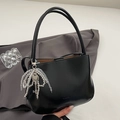 Minimalist black PU leather bucket bag with beads fringe and CLEAREK logo branding - Black (With Bow & Key Charm)