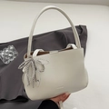 White PU leather bucket bag with top handle, crossbody strap and beaded bow charm - White (With Bow & Key Charm)