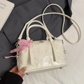 Creamy white Boston bag with embossed cartoon patterns and pink checkered bow ribbon - Off-White (Without Pendant)